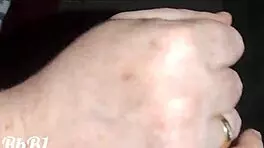 redhead milf gives handjob to big cock in homemade closeup