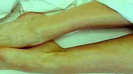 Sexy coed Rebecca masturbates under blanket