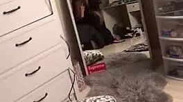 Young woman in dorm gives interracial blowjob