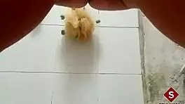 Warming up in the bathtub by inserting fingers