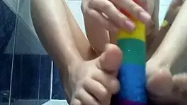 Cuntboy Xannie enjoys anal play in the shower with toys
