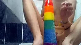 Cuntboy Xannie enjoys anal play in the shower with toys