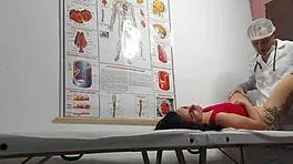 Gynecologist Examines Patient in Hospital Setting