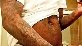 youngstarbrazy is warming up for new content, showing off her tattoo and monster cock