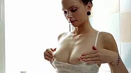 Antoinette's hot dildo play in the bath.