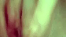 teen massages wet pussy with fingers