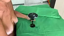 Tell me, how does this mature woman milk her partner's balls?