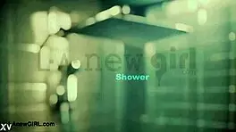 Smoldering brunette beauty enjoys a relaxing shower