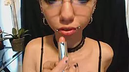 Goth Girl Applies Lipstick and Drools Playfully