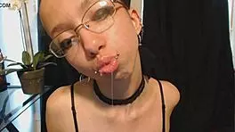 Goth Girl Applies Lipstick and Drools Playfully