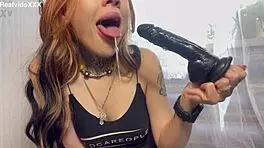 Toy blowjob throating with abundant saliva