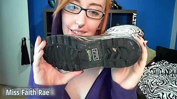 Lick my rainboots now, Miss Faith Rae's full video is wild with domination and dirty talk, don't miss this redhead in glasses!