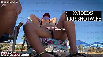 Kriss hotwife rocks micro bikini at beach showing off her big pussy.