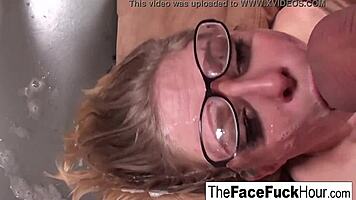 Teen in glasses eagerly slobbers on his throbbing cock