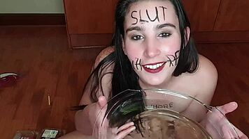 Self-degrading slut eats piss-covered fruits with body writing 😈