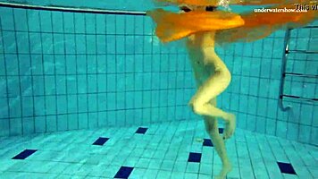 Nastya strips clothes and shows body in pool