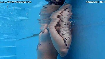 casual-narrative cute blonde mimi cica swimming underwater in pool