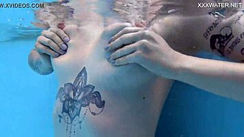 casual-narrative cute blonde mimi cica swimming underwater in pool