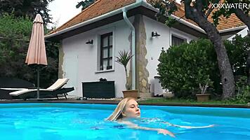 casual-narrative cute blonde mimi cica swimming underwater in pool