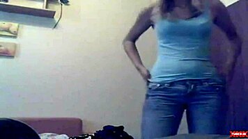 Young teen amateur tears clothes in live webcam striptease undressing
