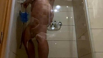having fun in the shower with brunette milf