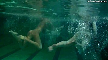 underwater lesbian bathing turns steamy on beach