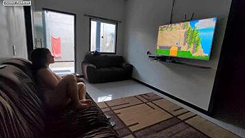 Teen brunette plays videogame on guy's lap, discovers huge interracial cock leading to amateur orgasm