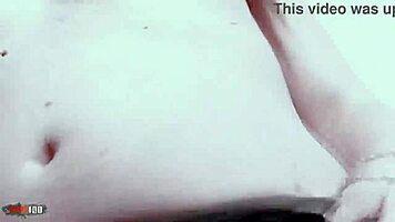 hey, watch allya the hot brunette babe rip her clothes off on the beach rocks, teasing with her small tits and stockings?