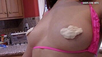 Both young girls take a cock in the kitchen