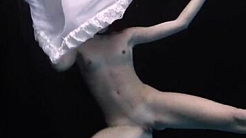 aqua girl andrejka strips underwater in pool