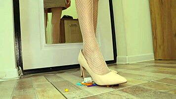 Wife in heels crushes toys with her big ass and small tits exposed.