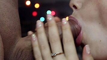 wife gives close-up attention to friend under romantic lights