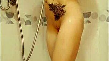 cute girl uses dildo in shower