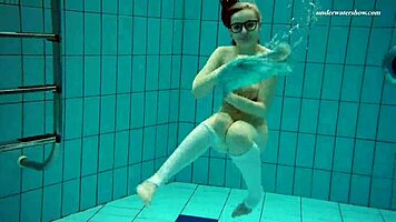 Dasha Explores Underwater Depths At The Beach