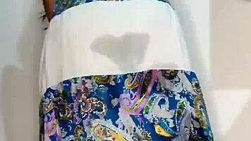 bluee squirts on her skirt and finally pisses for you