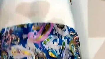 bluee squirts on her skirt and finally pisses for you