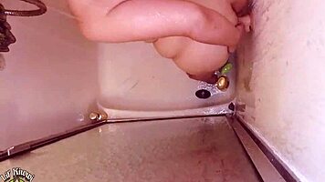 Man sneaks into bathroom to record chubby bbw teen masturbating with toys in shower