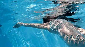 lana the hot chick swims nude underwater, showing her small tits