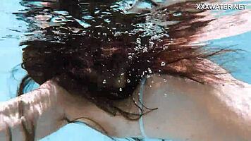 lana the hot chick swims nude underwater, showing her small tits