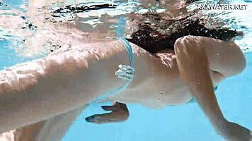 lana the hot chick swims nude underwater, showing her small tits