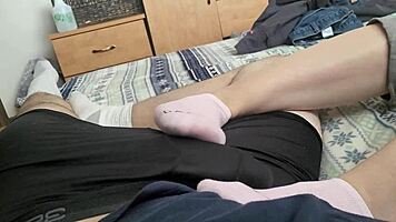 Shy teen teases friend's cock with toes, delivers footjob to cumshot!