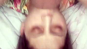 Young girl has sex with a man and while climaxing she chokes and get a facefull of cum