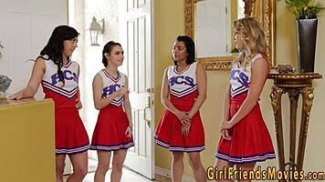 Cheerleader and teen engage in friendly rubbing activity