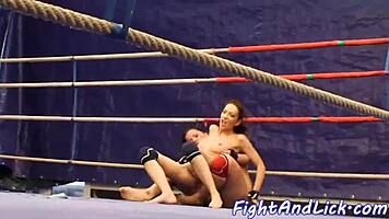 Busty European babes wrestle naked in the ring for dominance