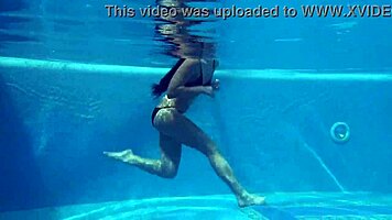 kittina ivory undresses in the swimming pool