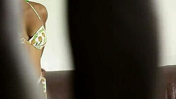 I’m lovin’ this cute sexy ebony babe in bikini, she’s pure chocolate heat, ya know! Gotta watch her.