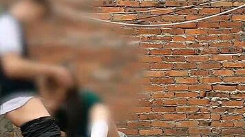 She sucks her classmate's cock behind the school classrooms in this public Mexican sex video.