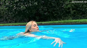 nude swimming in the pool babe with tattoos mimi cica