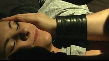 brunette gets tied up fingered and cum in mouth during bdsm massage