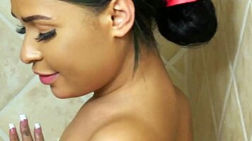 Tiny brunette enjoys a relaxing hot shower